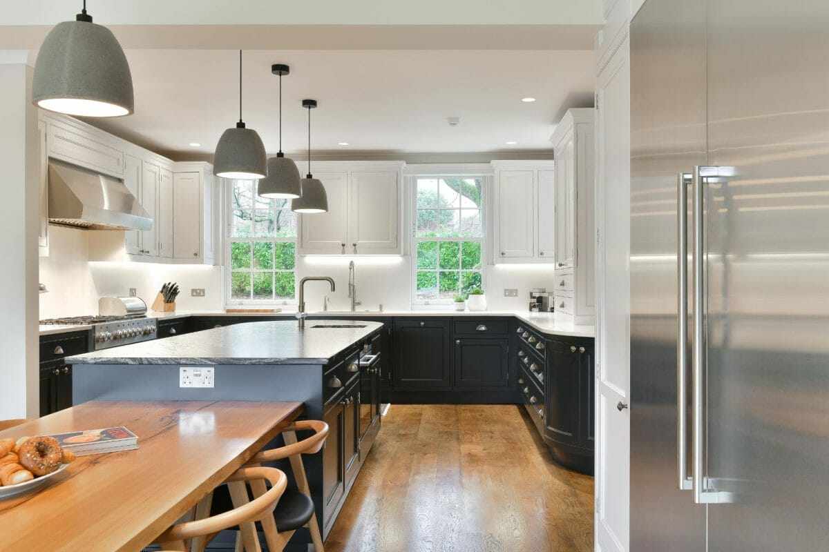Ashley Jay Dark Shaker Kitchen (8) Dark Shaker Kitchen with fridge and island with connecting dining table