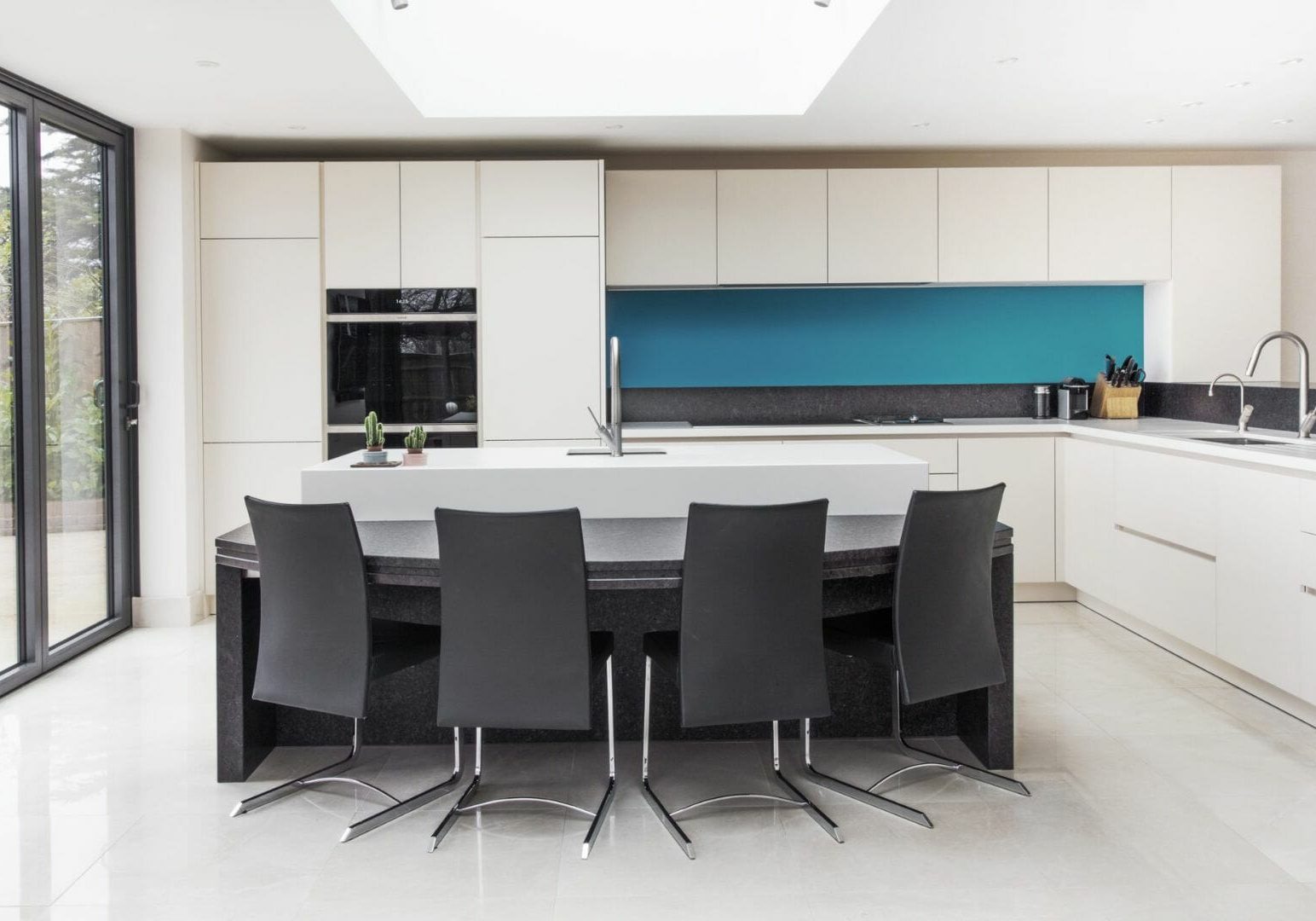 Ashley Jay Matt Glass Door Kitchen Project resized (6) White Handleless Kitchen with Dinner table Island